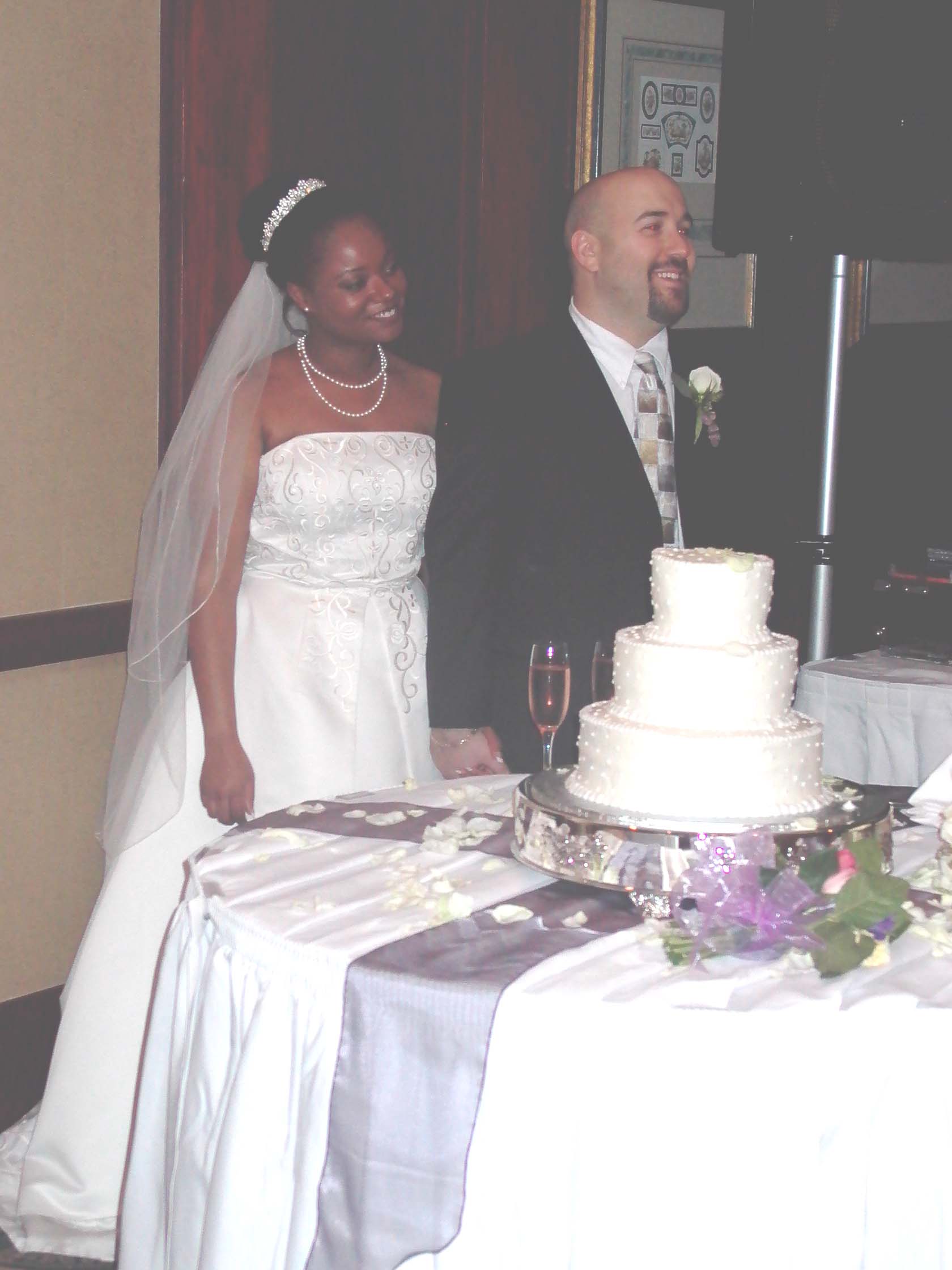 kenyaandadamcuttingcake.jpg
